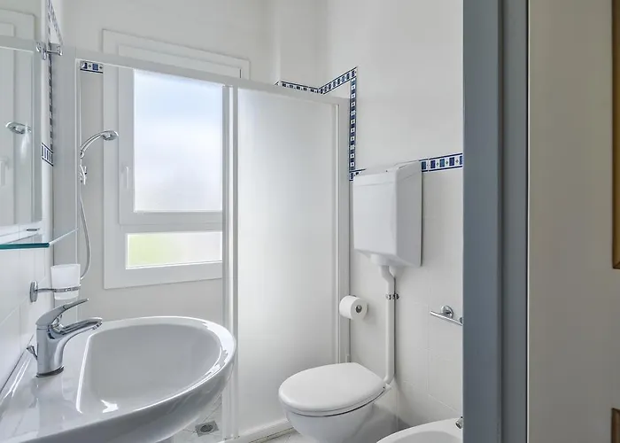 Hotel Corona ريتشيوني